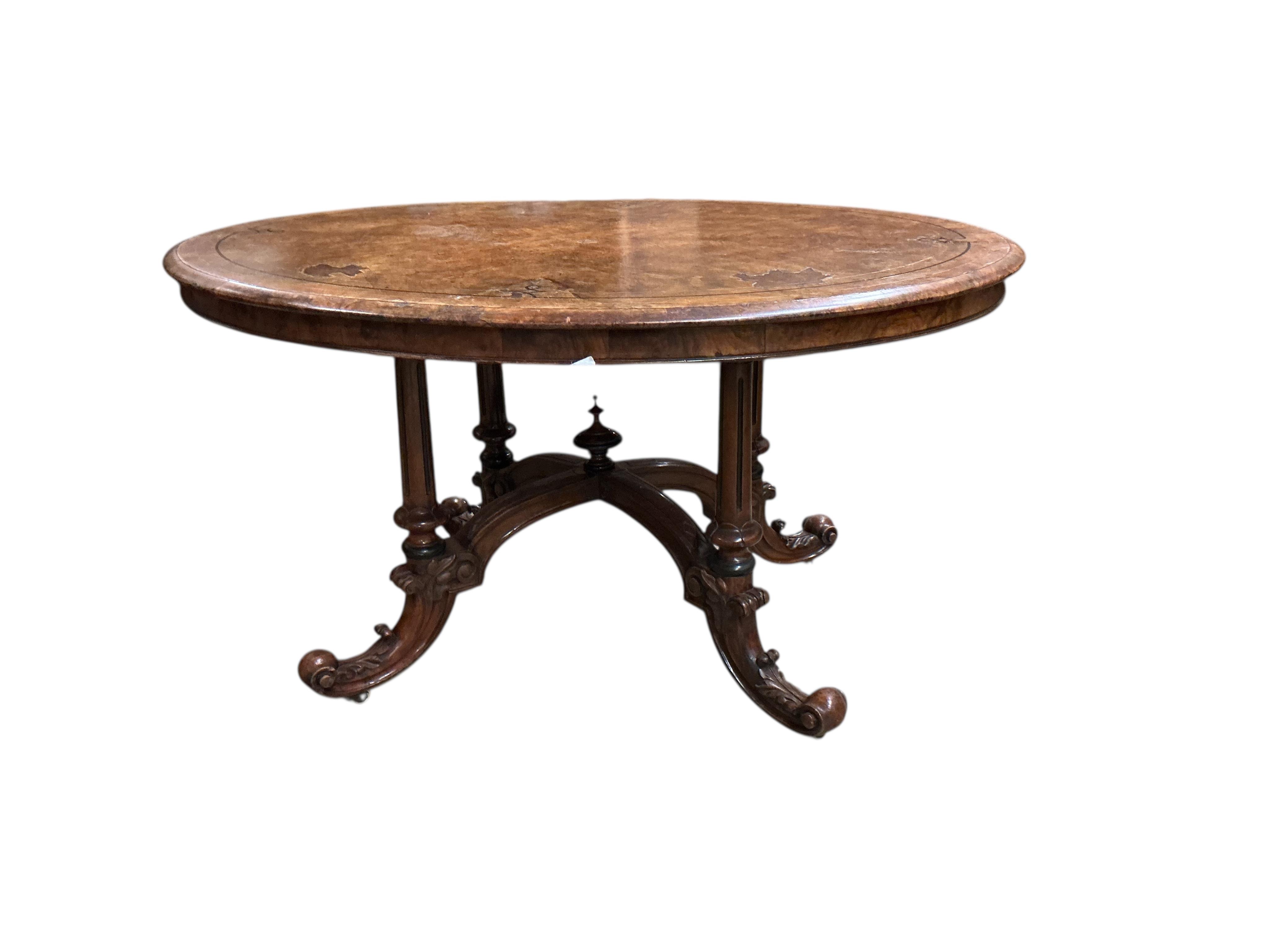 A late Victorian inlaid walnut oval loo table, width 130cm, depth 100cm, height 70cm